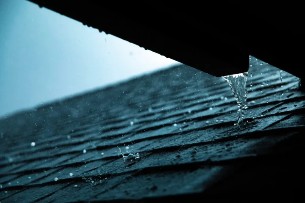 rain falling on shingle roof